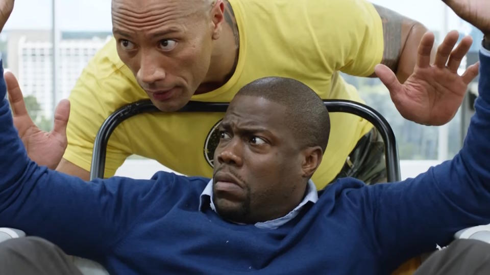 Dwayne Johnson whispers in Kevin Hart's ear in Central Intelligence