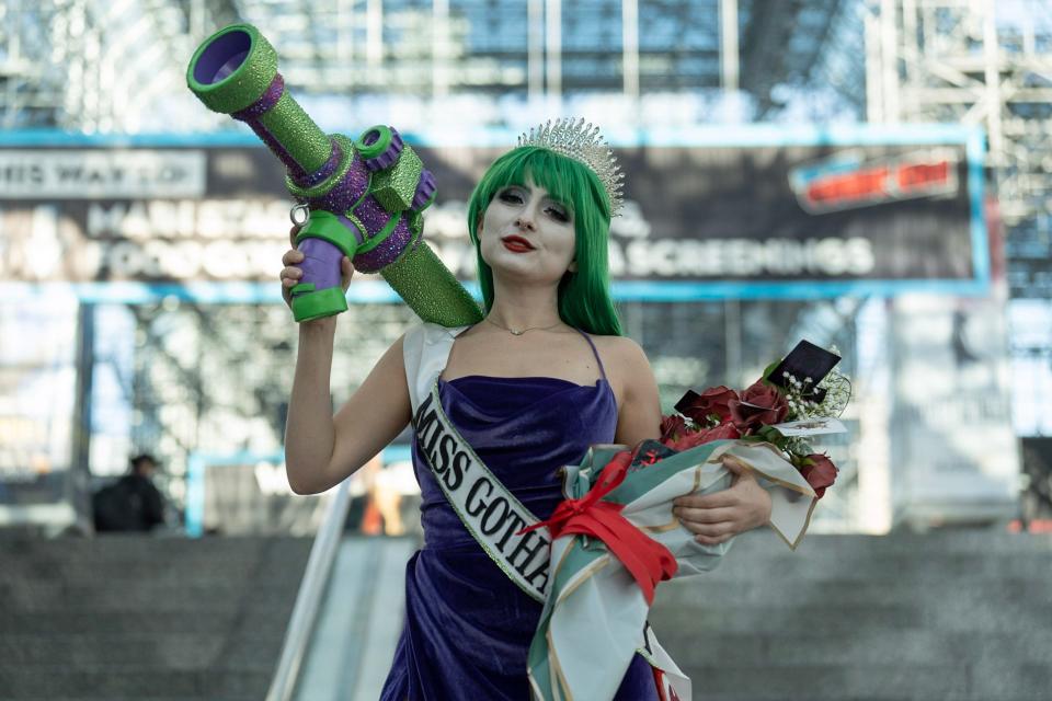 A cosplayer dressed as Miss Gotham at New York Comic Con 2022.