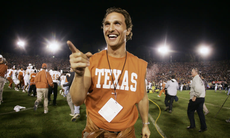 Matthew McConaughey celebrating on the field after a Texas Longhorns game.