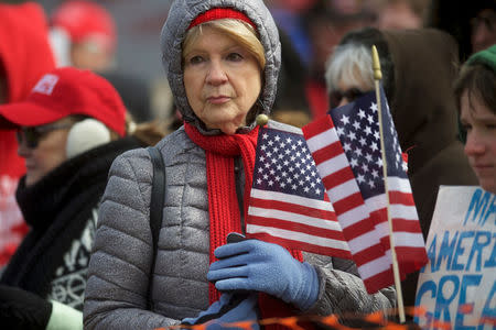 FILE PHOTO: Supporters of President Donald Trump gather for a "People 4 Trump" rally at Neshaminy State Park in Bensalem, Pennsylvania, U.S. March 4, 2017. REUTERS/Mark Makela/File Photo