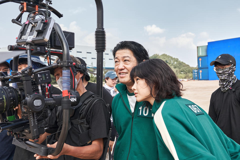 Jung Ho-yeon, right, behind the scenes during the filming of 