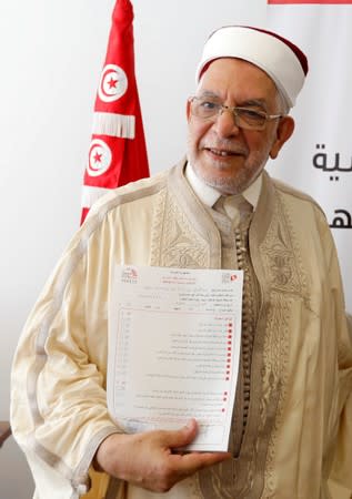 Abdel Fattah Morou, vice-president of the moderate Islamist party Ennahda, presents his candidacy for the presidential election, in Tunis