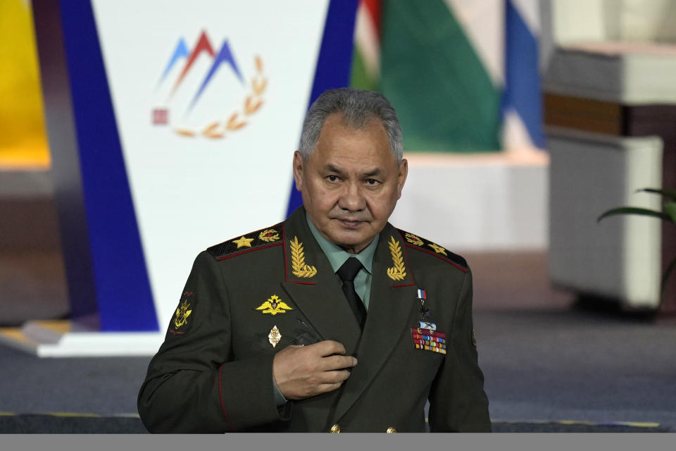 Russian Defense Minister Sergei Shoigu walks down from the podium after speaking at the 10th Beijing Xiangshan Forum held in Beijing, Monday, Oct. 30, 2023. Defense Minister Shoigu said Monday the United States is fueling geopolitical tensions to uphold its "hegemony" and warned of the risk of confrontation between major countries. (AP Photo/Ng Han Guan)