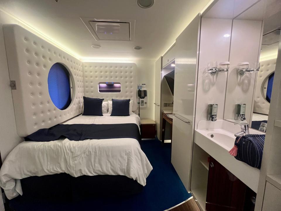 Norwegian Getaway full-sized bed with white padding around it