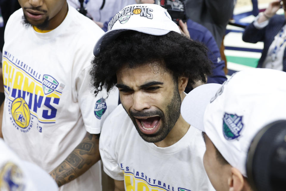 Kent State guard Sincere Carry celebrates after defeating Toledo in an NCAA college basketball game to win the championship of the Mid-American Conference Tournament, Saturday, March 11, 2023, in Cleveland. (AP Photo/Ron Schwane)