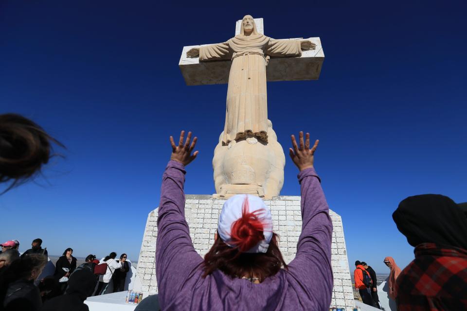 Catholics and other Christians make a pilgrimage to the summit of Mount Cristo Rey to pray in observance of Good Friday, Friday, April 7, 2023.