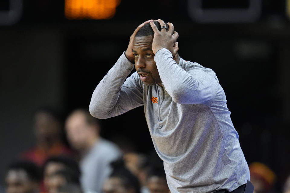 FILE - Oklahoma State head coach Mike Boynton reacts to a call during the first half of an NCAA college basketball game against Iowa State, Saturday, Jan. 13, 2024, in Ames, Iowa. Oklahoma State announced Thursday, March 14, 2024, that it has fired men’s basketball coach Mike Boynton. (AP Photo/Charlie Neibergall, File)