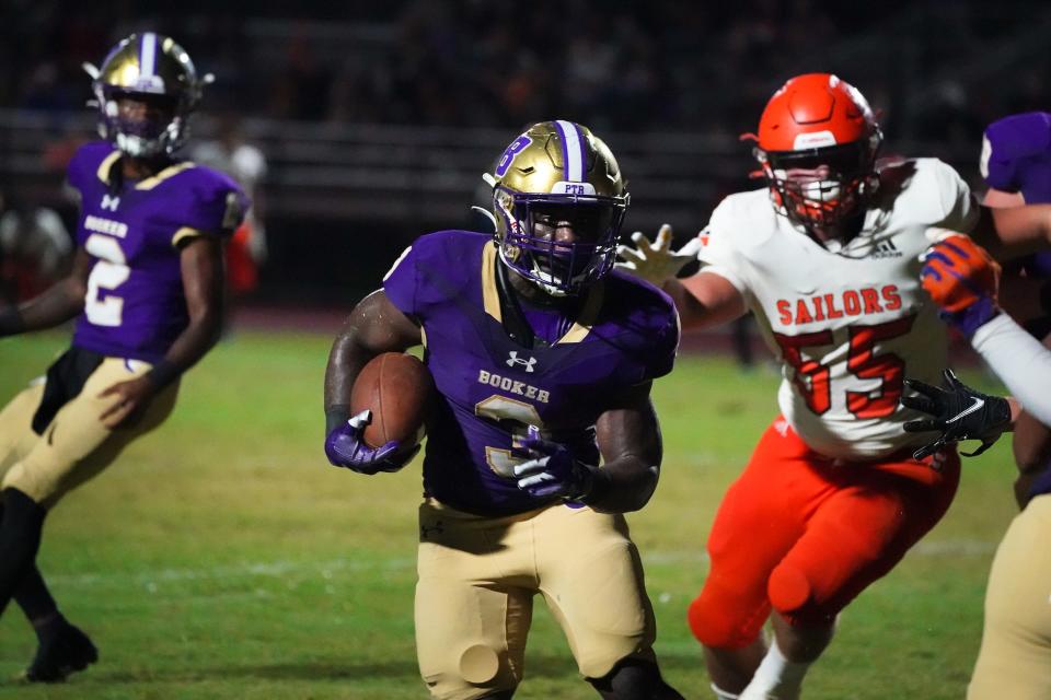 Booker running back Ahmad Hunter runs up field during Friday night's game against Sarasota.