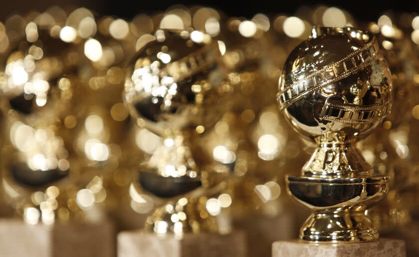 A series of golden globe statuettes