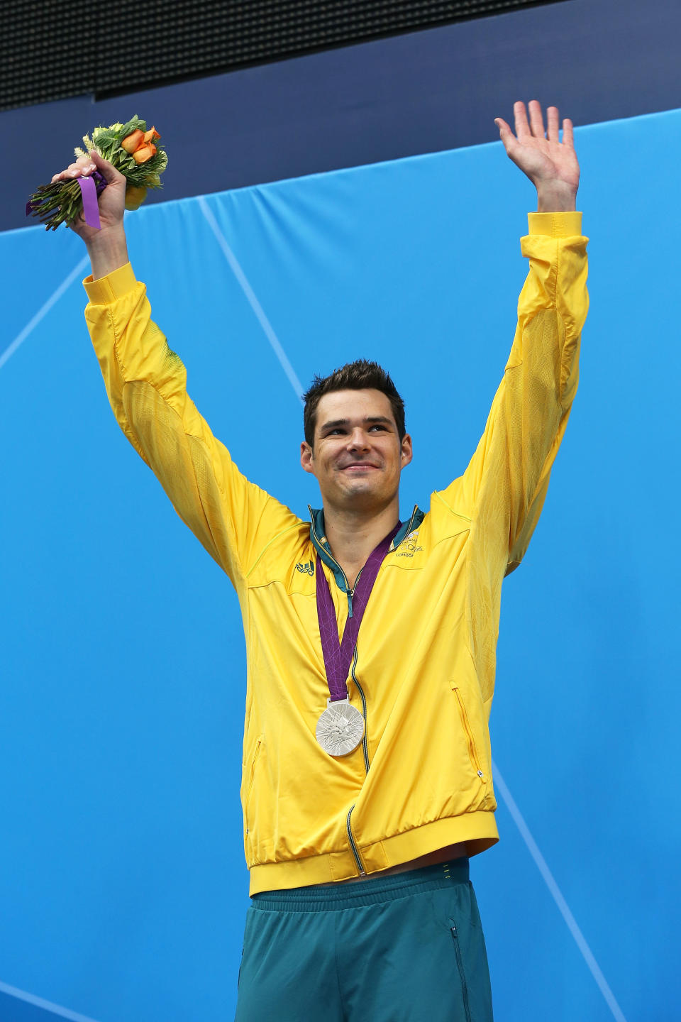 Silver medallist Christian Sprenger of Australia poses on the podium during the medal ceremony following the Men's 100m Breastsroke final on Day 2 of the London 2012 Olympic Games at the Aquatics Centre on July 29, 2012 in London, England. (Photo by Clive Rose/Getty Images)