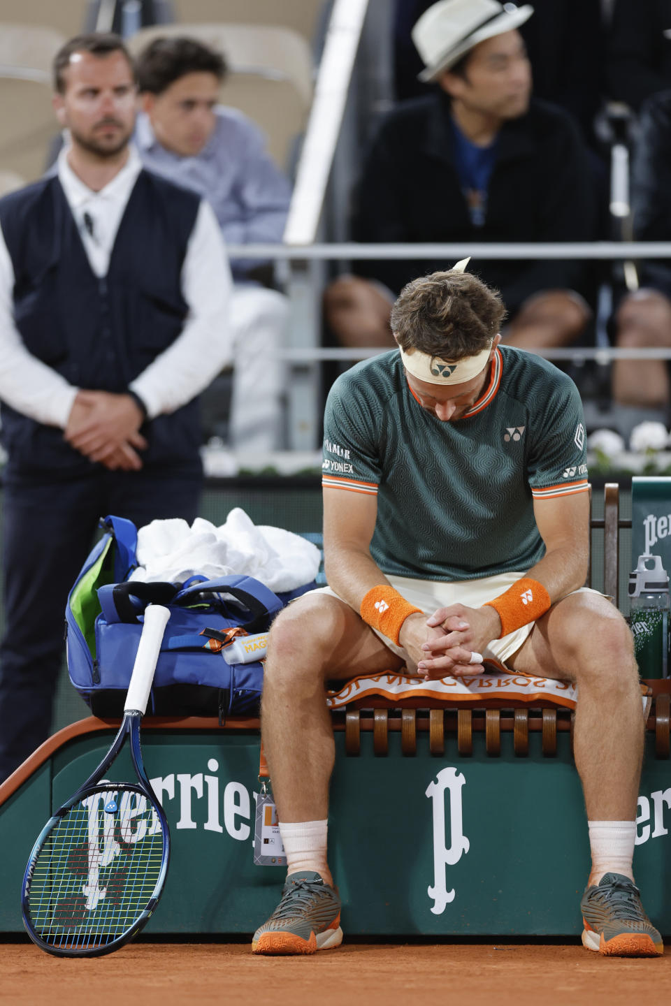 Norway's Casper Ruud sits on his bench during his semifinal match of the French Open tennis tournament against Germany's Alexander Zverev at the Roland Garros stadium in Paris, Friday, June 7, 2024. (AP Photo/Jean-Francois Badias)