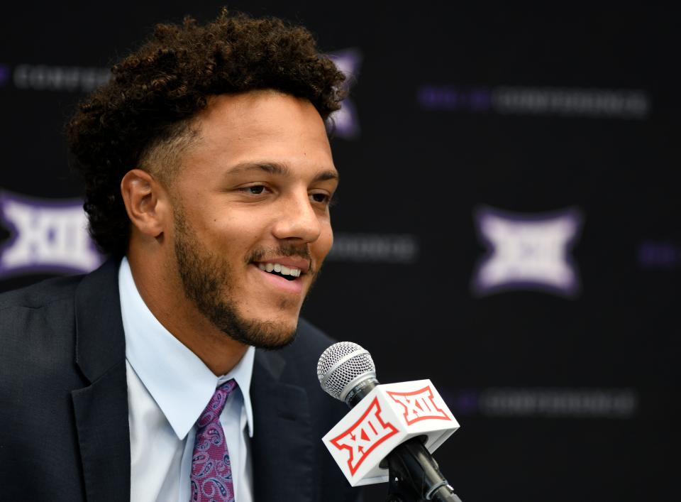 Kansas State’s Adrian Martinez smiles during the Big 12 football media days press conference, Wednesday, July 13, 2022, at AT&T Stadium in Arlington. 