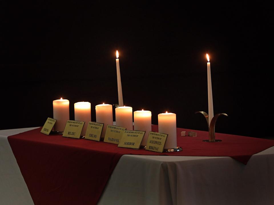 A Holocaust Remembrance Day Yom HaShoah tradition includes lighting memorial candles for the millions of Jews and other people murdered by the Nazis and their collaborators. 
(Photo: Carucha L. Meuse/The Journal News)