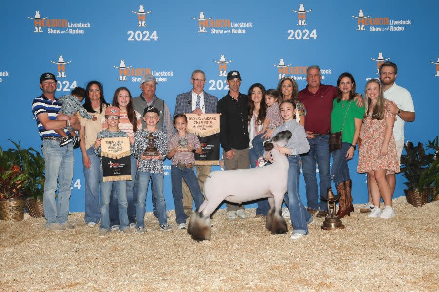 The Strube family and their friends celebrate Stratley’s success at RodeoHouston 2024.