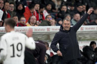 Germany's coach Hans-Dieter Flick looks at Germany's Mario Goetze, left, during the international friendly soccer match between Germany and Peru at the Opel Arena in Mainz, Germany, Saturday, March 25, 2023. (AP Photo/Michael Probst)