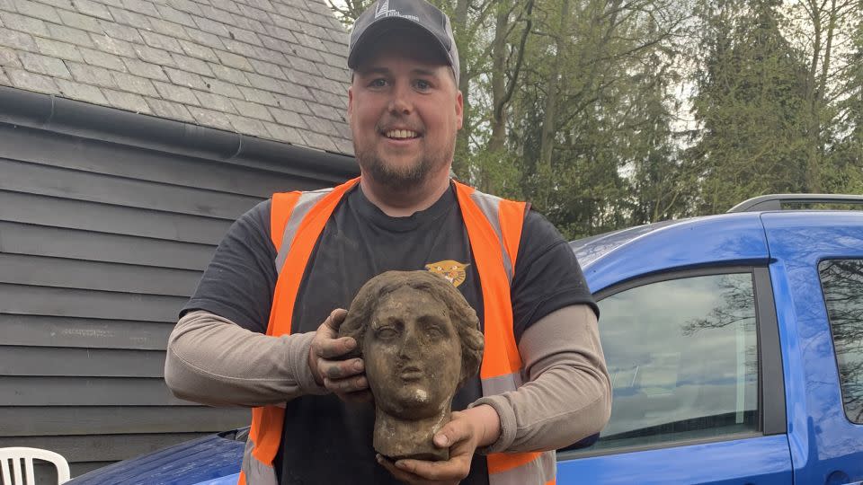 Greg Crawley found the ancient statue head while building a parking lot. - Burghley House