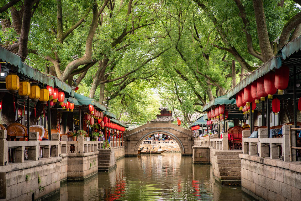 Tongli Ancient Town is nestled to the east of Beijing–Hangzhou Grand Canal, by Taihu Lake, Wujiang District, Suzhou, 10 kilometers (6 miles) from Suzhou, and 80 kilometers (50 miles) from Shanghai.