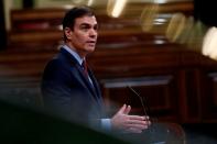 Spanish PM Sanchez delivers during a session on coronavirus disease (COVID-19) at Parliament in Madrid