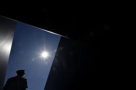 The sun is seen through an access corridor on Court 3 at the Wimbledon Tennis Championships in London, June 30, 2015. REUTERS/Toby Melville