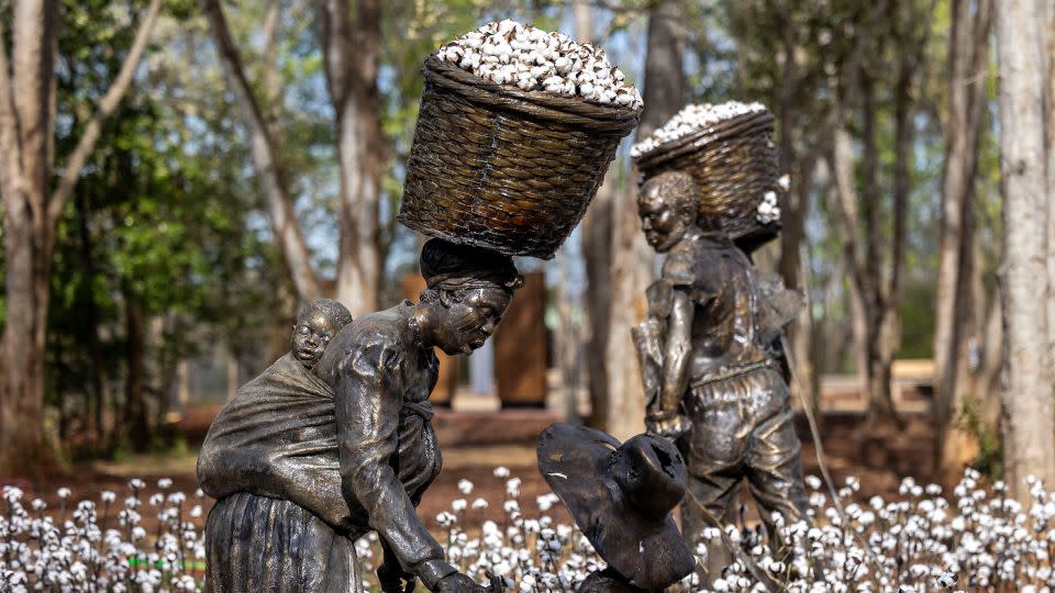 "Mama, I hurt my hand," by Kwame Akoto-Bamfo, bronze, 2023, during a media tour of Equal Justice Initiative's new Freedom Monument Sculpture Park. - Vasha Hunt/AP