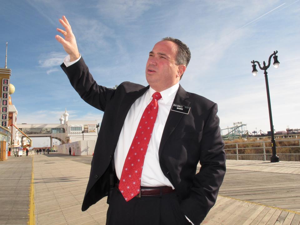 Mark Giannantonio, the new president of Resorts Casino Hotel, discusses on the Boardwalk in Atlantic City, N.J. Wendesday Jan. 2, 2013, the $60 million in renovations and expansion the Atlantic City N.J. casino will undertake in the first six months of 2013. Behind him on the Boardwalk is where the Jimmy Buffett-themed Margaritaville entertainment complex is being built. (AP Photo/Wayne Parry)