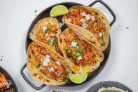 <p>These saucy chicken tacos (courtesy of our friend <a href="https://fitmencook.com/" rel="nofollow noopener" target="_blank" data-ylk="slk:Kevin Curry;elm:context_link;itc:0;sec:content-canvas" class="link ">Kevin Curry</a>) will make you wish every day was Taco Tuesday. We love them doused in the tangy avocado cream.</p><p>Get the <strong><a href="https://www.delish.com/cooking/recipe-ideas/a30615986/slow-cooker-chicken-tinga-tacos-recipe/" rel="nofollow noopener" target="_blank" data-ylk="slk:Slow-Cooker Chicken Tinga Tacos recipe;elm:context_link;itc:0;sec:content-canvas" class="link ">Slow-Cooker Chicken Tinga Tacos recipe</a></strong>.</p>