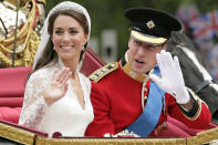 <b>7. Prince William & Catherine Middleton: </b>Catherine, Duchess of Cambridge and Prince William, Duke of Cambridge travel down The Mall on route to Buckingham Palace in a horse drawn carriage following their wedding at Westminster Abbey on April 29, 2011 in London, England.