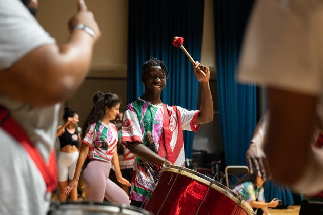 Paraiso School of Samba's Bateria accompanies Samba dancers as they rehearse ahead of the Notting Hill Carnival. (Photo: Clara Watt for HuffPost)