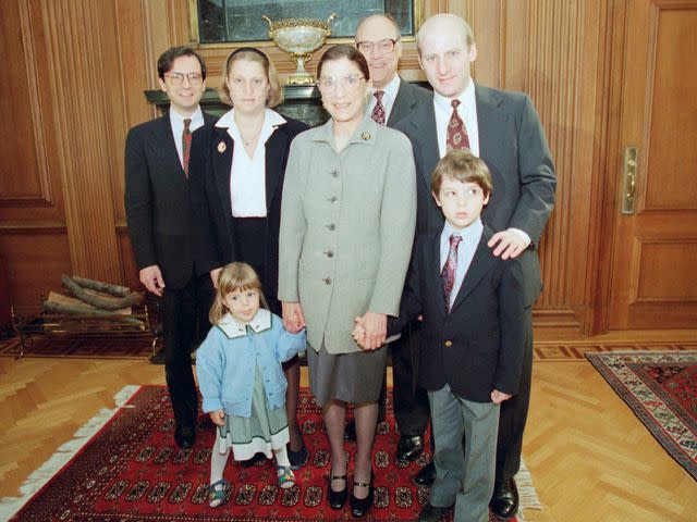 <p>Doug Mills/AP</p> Ruth Bader Ginsburg poses with her family in 1993