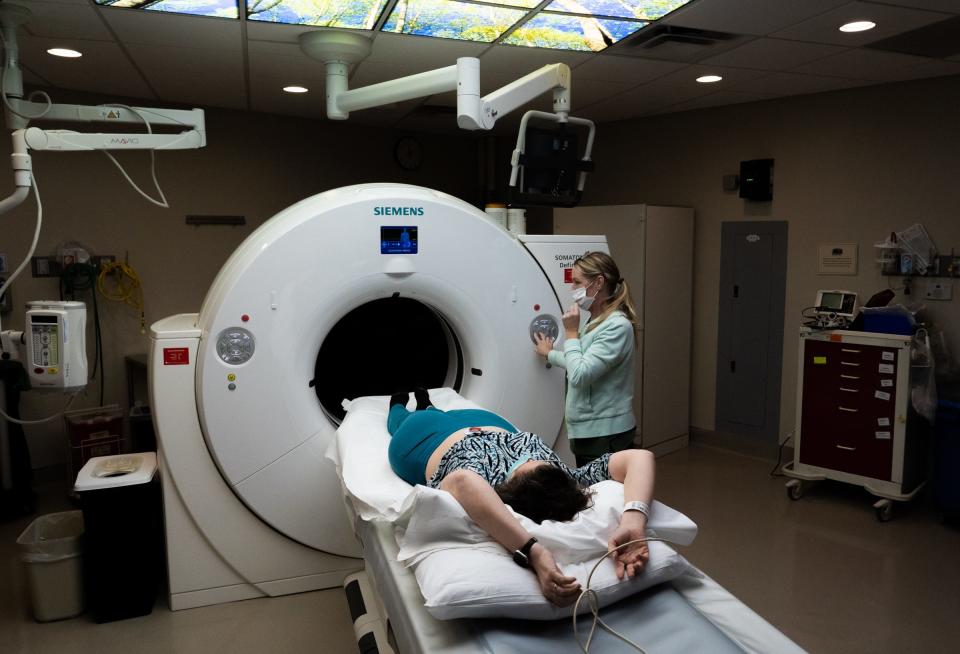 American-Statesman health reporter Nicole Villalpando receives a  HeartSaver CT scan at Heart Hospital of Austin. The scan, which is not covered by insurance and costs $99, can help physicians assess someone's risk of a future heart attack and take action to reduce that risk early.
