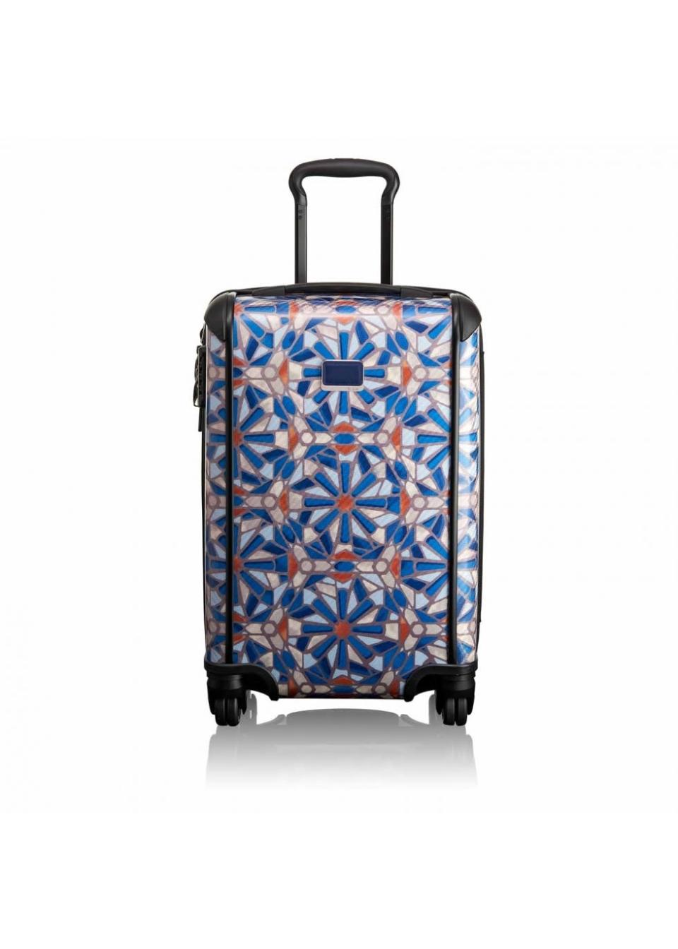 <p>Immediately get in the holiday mood packing this cayenne tile print case.<i><a href="http://www.harveynichols.com/147457-international-carry-on/" rel="nofollow noopener" target="_blank" data-ylk="slk:[Tumi, £595];elm:context_link;itc:0;sec:content-canvas" class="link "> [Tumi, £595]</a></i></p>