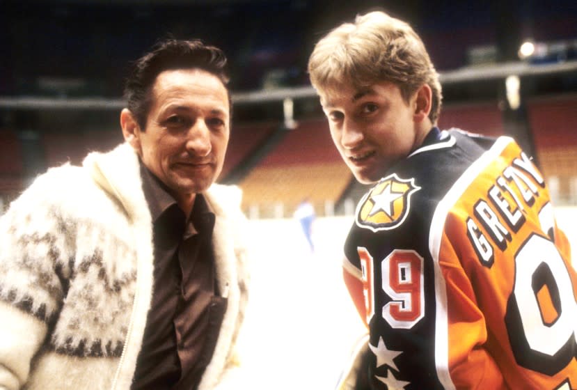 EAST RUTHERFORD, NJ - JANUARY 31: Wayne Gretzky #99 of the Campbell Conference and the Edmonton Oilers talks to his father Walter before the 1984 36th NHL All Star Game against the Wales Conference on January 31, 1984 at the Brendan Byrne Arena in East Rutherford, New Jersey. The Wales Conference defeated the Campbell Conference 7-6. (Photo by B Bennett/Getty Images)