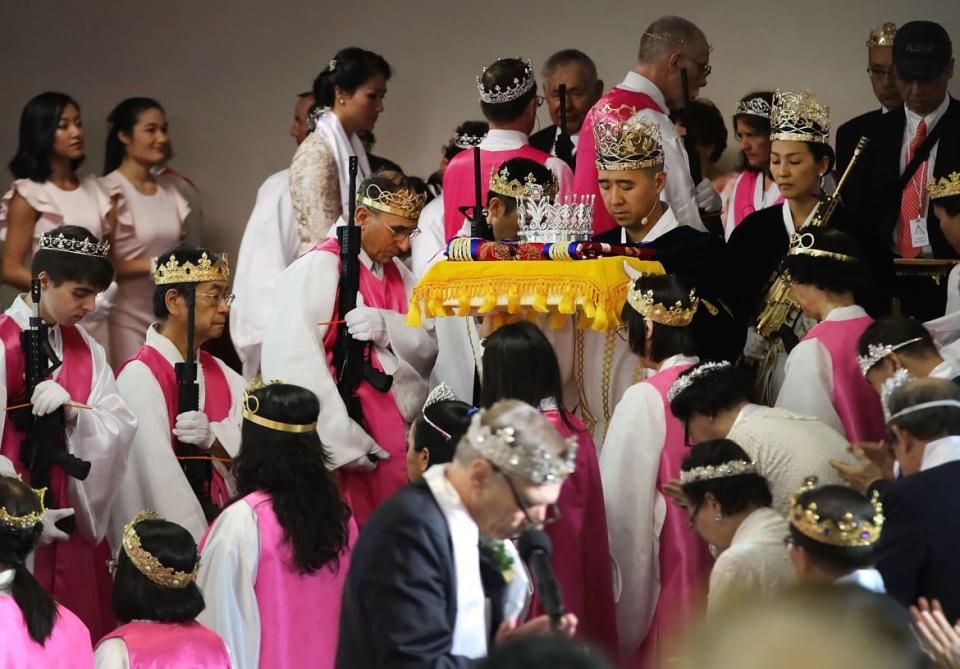 <div class="inline-image__caption"><p>Reverend Hyung Jin Moon participates in a ceremony at the World Peace and Unification Sanctuary on February 28, 2018 in Newfoundland, Pennsylvania. The controversial church believes the AR-15 symbolizes the "rod of iron" in the biblical book of Revelation.</p></div> <div class="inline-image__credit">Spencer Platt/Getty</div>