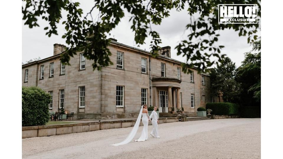 Lucy Spraggan and her wife Emilia outside their wedding venue