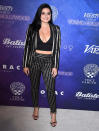 <p>She’s been making headlines lately for her provocative outfits (girl can do what she wants!), but we love this slightly-more refined look. Not everyone can pull off gold pinstripes. <i>(Photo by Steve Granitz/WireImage)</i></p>