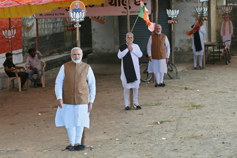Cut-outs of India's Prime Minister Narendra Modi and his Bharatiya Janata Party candidate Parshottam Rupala at an election campaign venue in Rajkot district in Gujarat (Indranil Mukherjee)