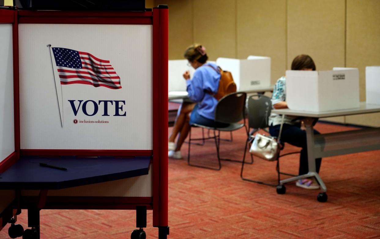 Voters cast their ballots Tuesday at the Boone County Public Library during the primary.