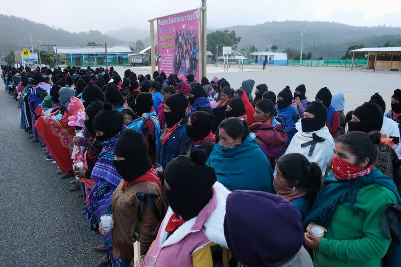 Women of the Zapatista National Liberation Army demonstrate along a highway during "A Day Without Women" protest, in Amatenango del Valle