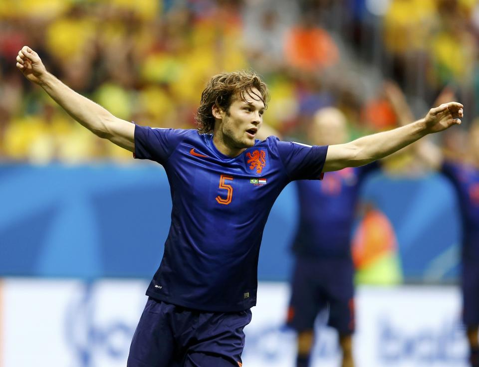 Daley Blind of the Netherlands celebrates scoring their second goal during their 2014 World Cup third-place playoff against Brazil at the Brasilia national stadium in Brasilia July 12, 2014. REUTERS/Dominic Ebenbichler (BRAZIL - Tags: SOCCER SPORT WORLD CUP TPX IMAGES OF THE DAY)