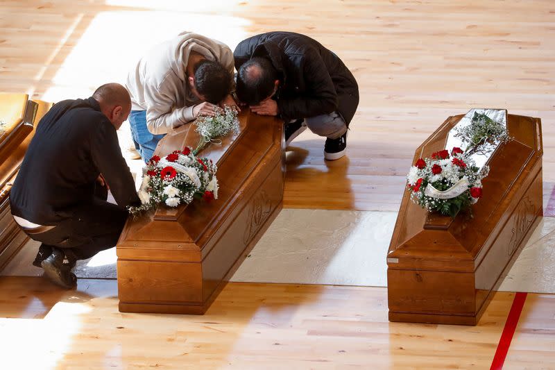 Mourners attend a lying-in-state for victims who died in a migrant shipwreck, in Crotone