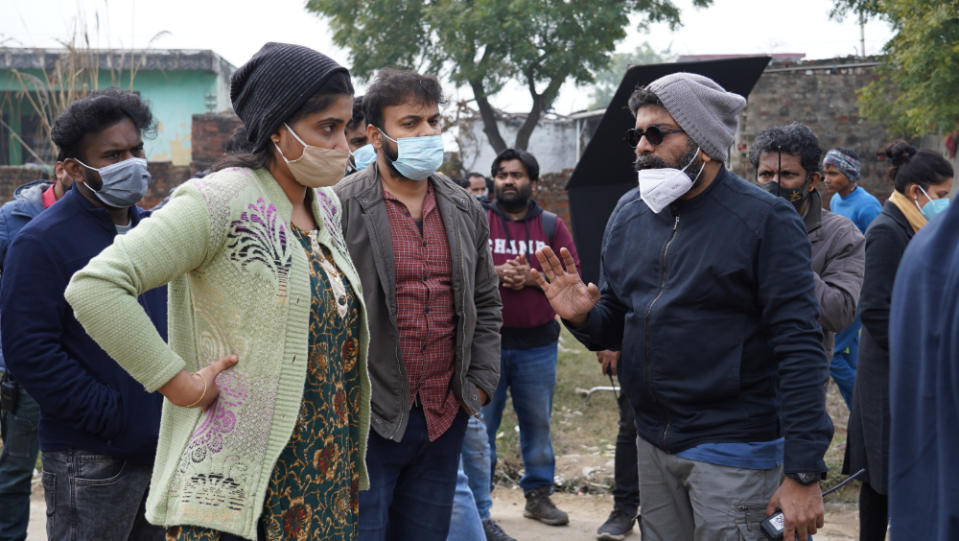 Divya Prabha, Kunchacko Boban and Mahesh Narayanan on the set of “Ariyippu” - Credit: Moving Narratives