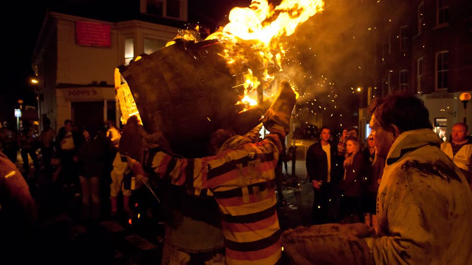 A photograph of a past  running of the tar barrels in Ottery St Mary in Devon, England. - Phil Clarke Hill/In Pictures/Getty Images