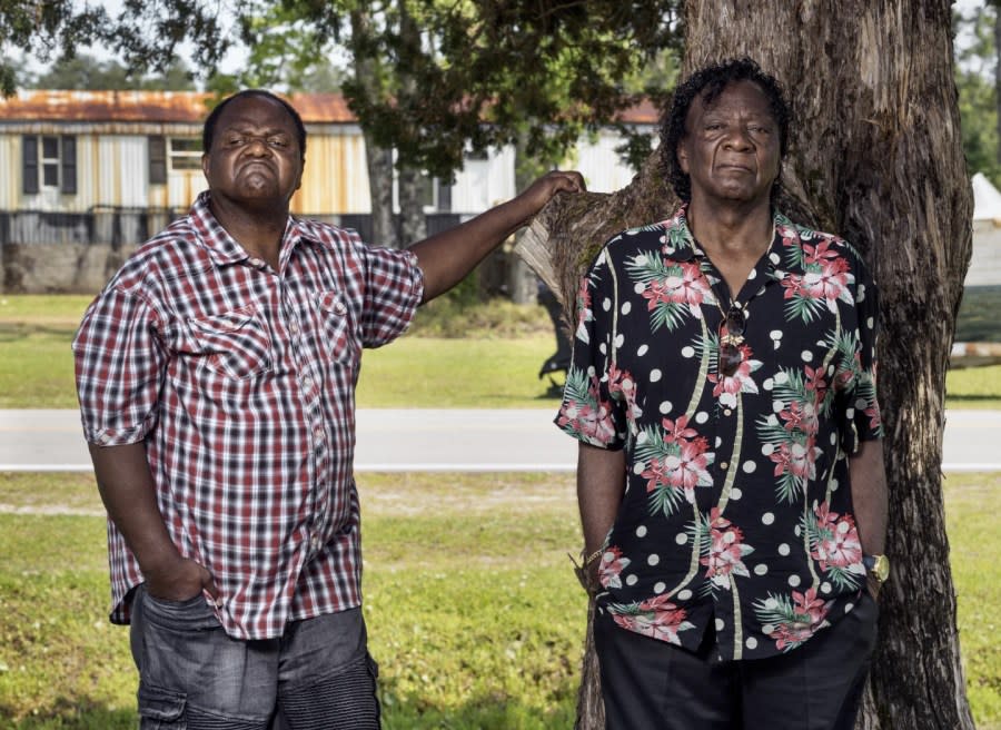 This image released by Amazon shows Licurtis Reels, left, and Melvin Davis from the documentary, “Silver Dollar Road.” (Wayne Lawrence/Amazon via AP)