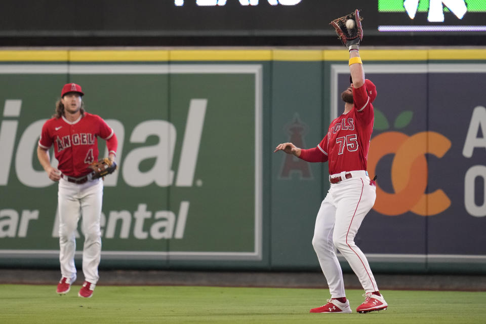 Los Angeles Angels right fielder Trey Cabbage (75) catches a fly ball hit by Cleveland Guardians' Gabriel Arias during the second inning of a baseball game in Anaheim, Calif., Thursday, Sept. 7, 2023. (AP Photo/Ashley Landis)