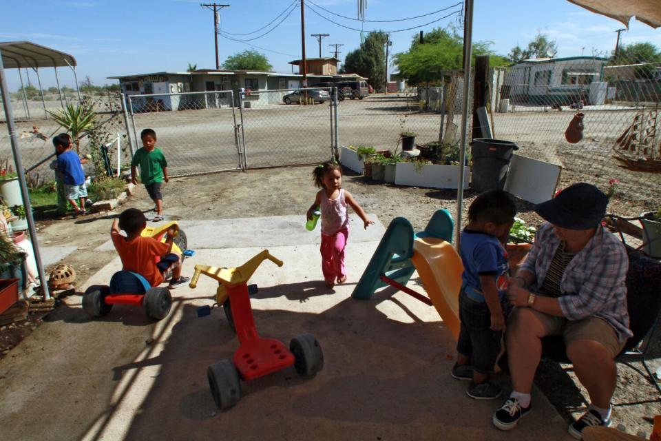 Martha Carrillo baby-sits the children of farmworkers in Duroville.