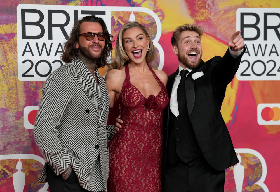 Pete Wicks, Zara McDermott and Sam Thompson arrive for the BRIT Awards at the O2 Arena in London, Britain, March 2, 2024. REUTERS/Maja Smiejkowska