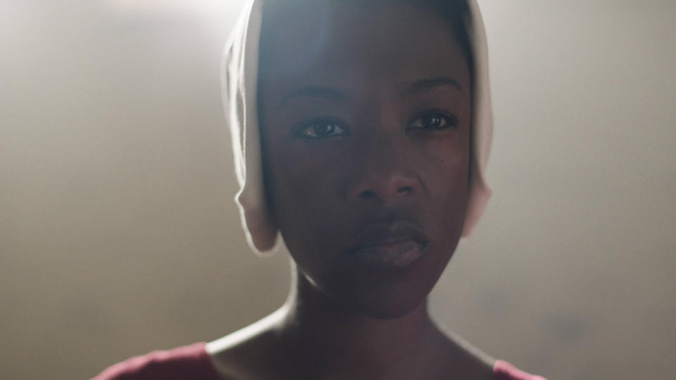 Portrait of a Samira Wiley in The Handmaid's Tale looking directly at the camera with a neutral expression