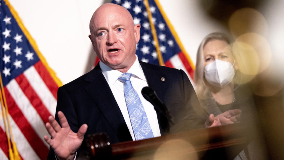 Senator Mark Kelly of Arizona speaks at a news conference after the weekly Democratic caucus luncheon on Capitol Hill. 