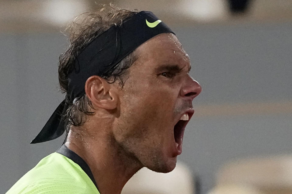 Spain's Rafael Nadal shouts as he plays Serbia's Novak Djokovic during their semifinal match of the French Open tennis tournament at the Roland Garros stadium Friday, June 11, 2021 in Paris. (AP Photo/Michel Euler)