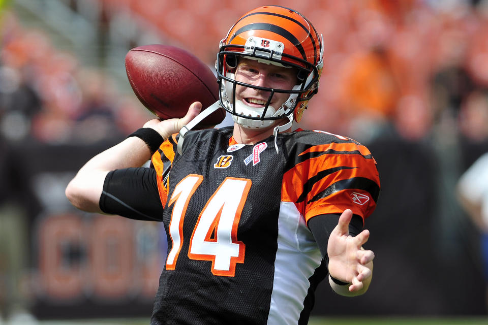 CLEVELAND, OH - SEPTEMBER 11: Starting quarterback Andy Dalton #14 of the Cincinnati Bengals warms up prior to the season opener against the Cleveland Browns at Cleveland Browns Stadium on September 11, 2011 in Cleveland, Ohio. (Photo by Jason Miller/Getty Images)